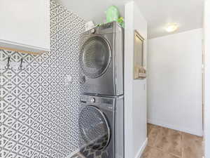 Laundry room with stacked washer / drying machine