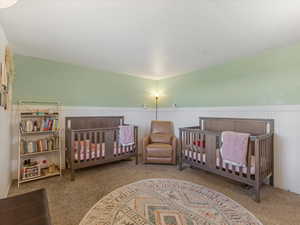 Carpeted bedroom (3) with wainscoting
