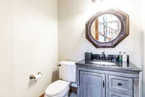 Half bath with toilet and vanity