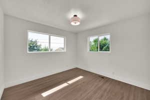 Empty room with wood finished floors