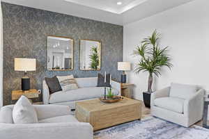Living room featuring recessed lighting and baseboards