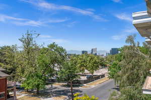 Exterior space with a city view and a mountain view