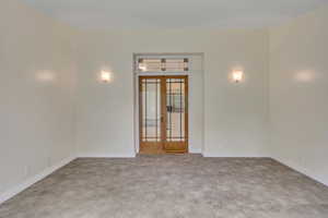 Family room accessed through historic french doors.