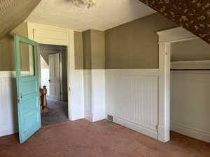 Bedroom #2 looking across landing to bedroom #1. Bedroom #3 to the right.