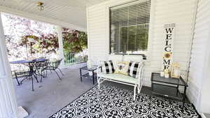 Wrap around porch and front entry.
