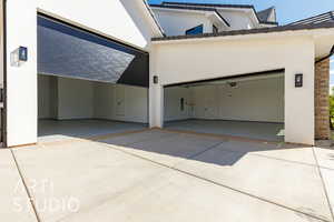 Garage with concrete driveway