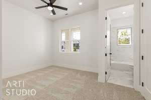 Unfurnished bedroom featuring connected bathroom, recessed lighting, ceiling fan, light carpet, and light marble finish flooring