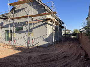 View of property exterior featuring stucco siding