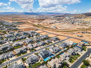 View of property location with nearby suburban area and a mountainous background