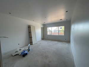 Unfurnished room featuring concrete floors