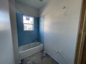 Full bath with a bath