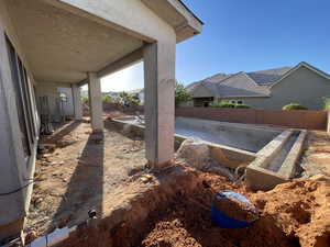 View of fenced backyard