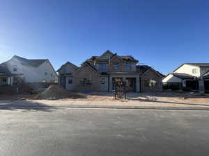 View of front of house with brick siding and a residential view