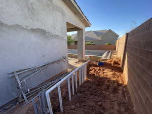 View of fenced backyard
