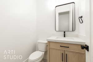 Bathroom with vanity and toilet