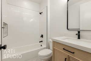 Bathroom featuring vanity and bathtub / shower combination
