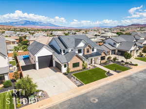 Aerial view of residential area featuring mountains