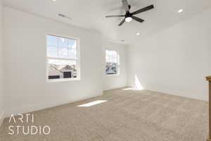 Empty room featuring light colored carpet, recessed lighting, and a ceiling fan