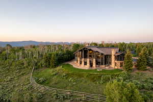 Aerial view at dusk of a wooded view