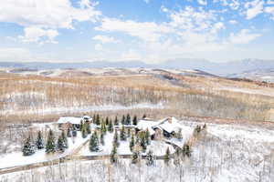 View from above of property with a mountainous background