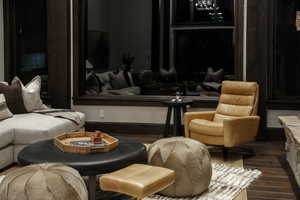 Living room featuring dark wood-style floors