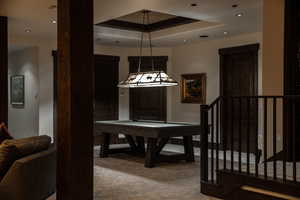 Playroom with carpet, recessed lighting, and a raised ceiling