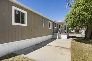 View of home's exterior with a patio
