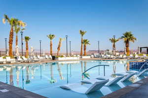 Community pool featuring a patio