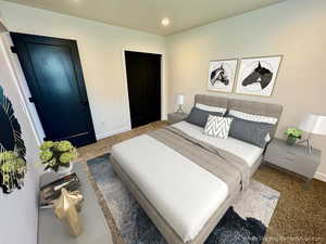 Carpeted bedroom with baseboards and recessed lighting