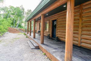Entrance to property with a porch