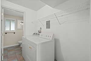 Basement apartment laundry room with washer and dryer