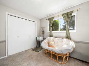 Sitting room with carpet floors