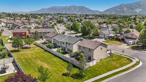 Aerial view of residential area with a mountain backdrop