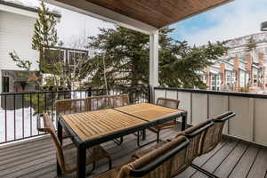 Wooden terrace with outdoor dining area