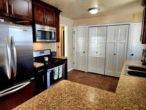 Kitchen featuring stainless steel appliances