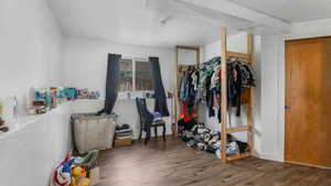 Bedroom with wood finished floors
