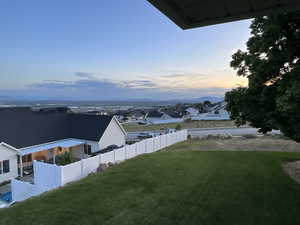View of yard at dusk
