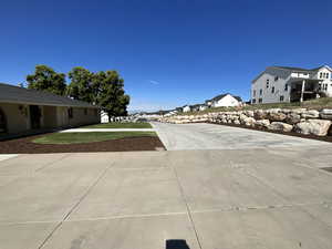 View of concrete surface featuring a residential view
