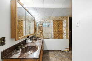 Full bathroom with double vanity