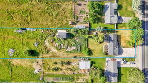 Aerial overview of property's location featuring property boundaries highlighted