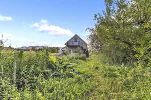 View of two-story outbuilding exterior