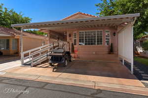 View of front facade featuring a tile roof