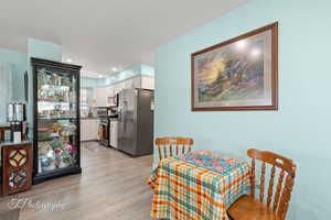 Dining room featuring light wood-style flooring