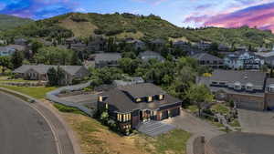 Aerial view of residential area with a mountain backdrop