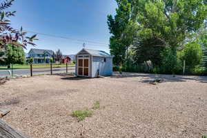 View of yard with a shed