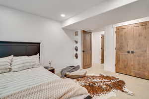 Bedroom featuring recessed lighting and baseboards