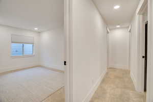 Hall featuring recessed lighting