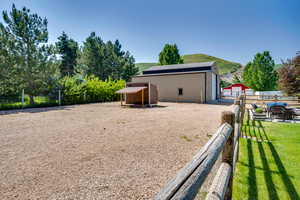 View of yard with an outbuilding and a mountain view