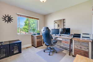 Office featuring baseboards and carpet flooring