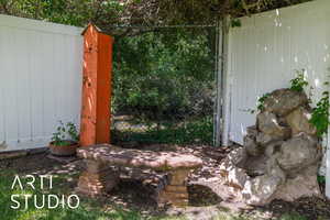 View of ditch behind fence for duck watching